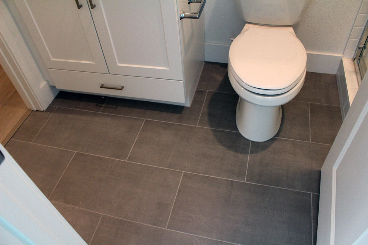 Master Bathroom Stagged Porcelain Tile Floors